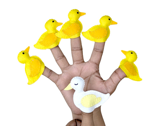 Set 5 little ducks finger puppets on fingers.
